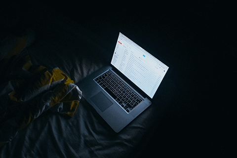 Laptop in the darkness